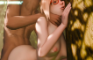 Darcy Redd polishes tree bark with her cheek
